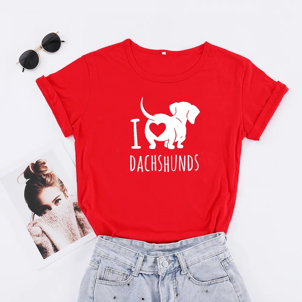 red t-shirt with a white silhouette of a dachshund with the words I heart Dachshunds (picture of heart on the back end of dachshund)