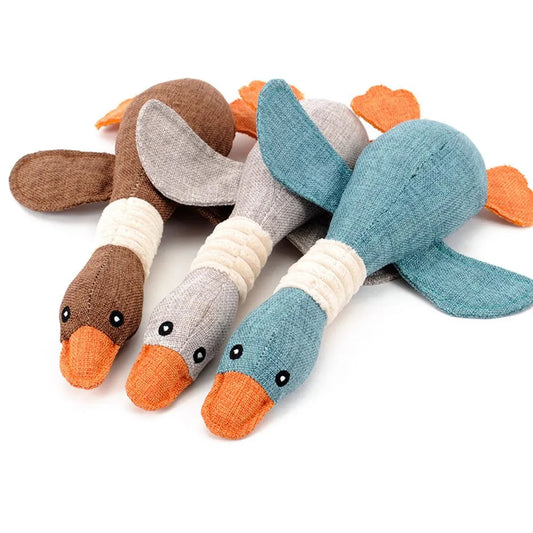 Goose chew toy for your pet, soft cotton material that is strong for the chewing. the chew toy squeaks when it is chewed. helps relieve stress and your pet chewing on other items. the goose comes in either brown, grey, blue