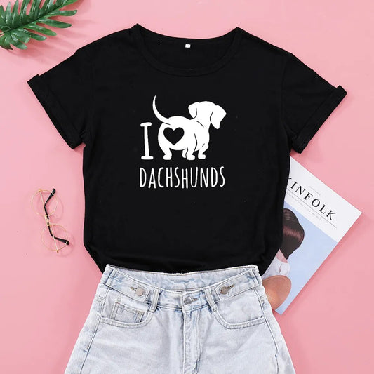 black t-shirt with a white silhouette of a dachshund with the words I heart Dachshunds (picture of heart on the back end of dachshund) 