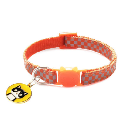 reflective cat collar, orange with yellow tag with a black cat