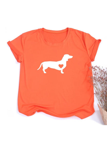 orange t-shirt with a white silhouette of a dachshund with a heart shape on the dog