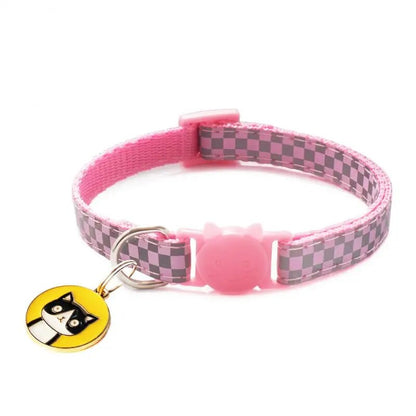 reflective cat collar, pink with yellow tag with a black cat