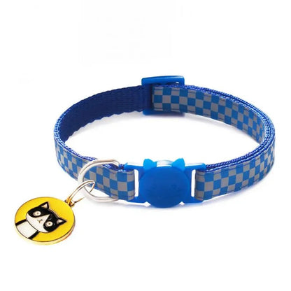 reflective cat collar, royal blue with yellow tag with a black cat