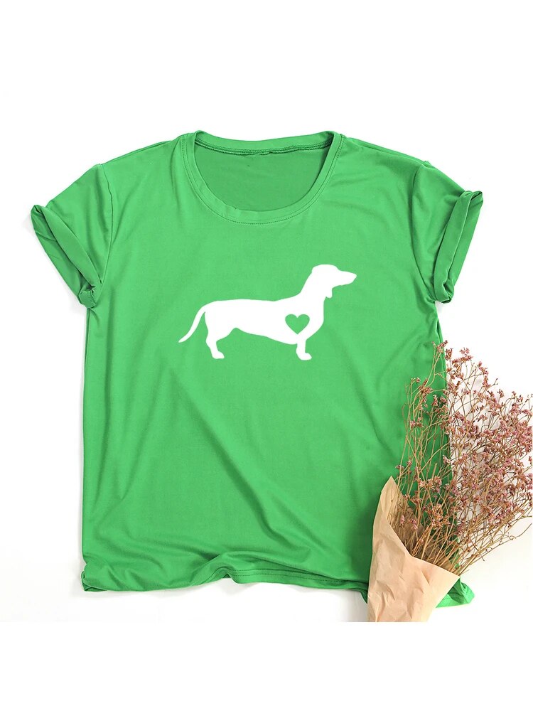 green t-shirt with a white silhouette of a dachshund with a heart shape on the dog