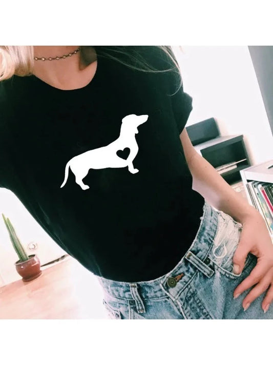 black t-shirt with a white silhouette of a dachshund with a heart shape on the dog 