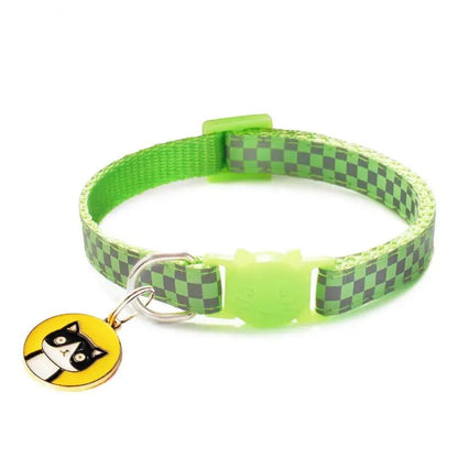 reflective cat collar, fluorescent green with yellow tag with a black cat